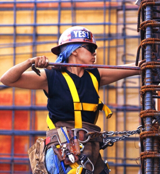 Construction worker wearing safety gear while working